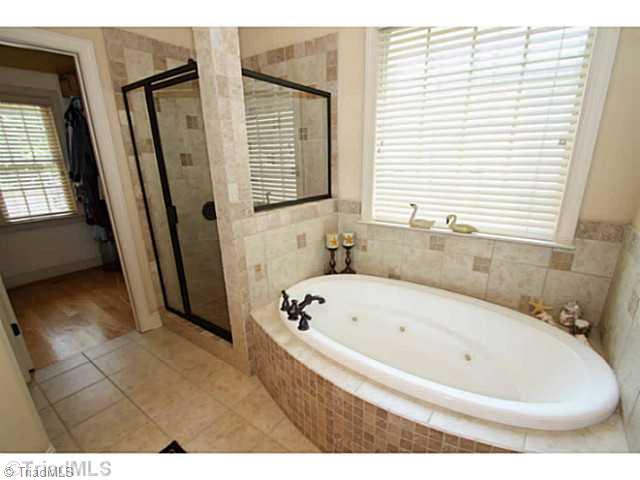 223 Essex Farm Road Advance, NC 27006 - Photo 11 of 16 Master Bath/Spa. Luxurious master bath with lovely tile shower and jetted soaking tub