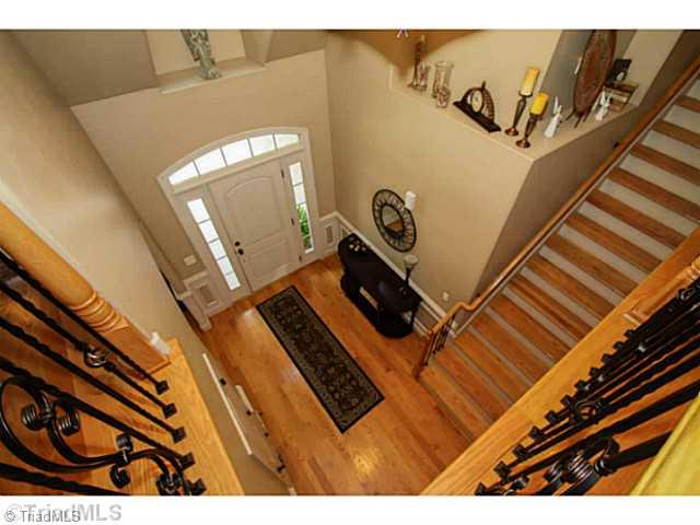 223 Essex Farm Road Advance, NC 27006 - Photo 5 of 16 Entry. 2 story foyer with lovely wrought iron baluster railings