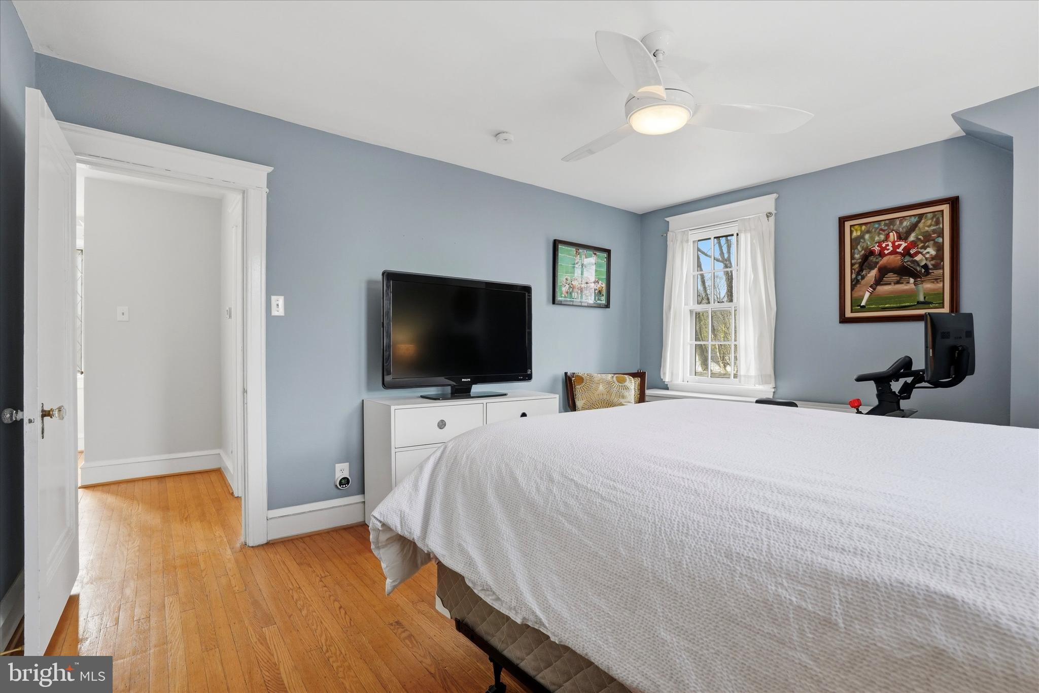 310 Old Forest Road Wynnewood, PA 19096 - Photo 29 of 35 a bedroom with a bed and a flat screen tv