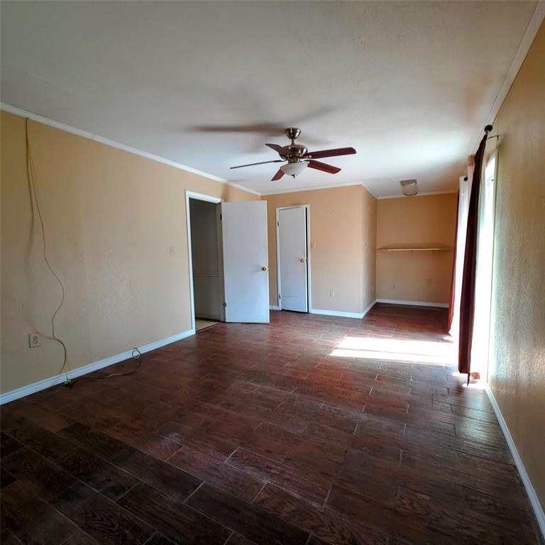 285 Montgomery Road Mineral Wells, TX 76067 - Photo 17 of 26 a view of empty room with wooden floor