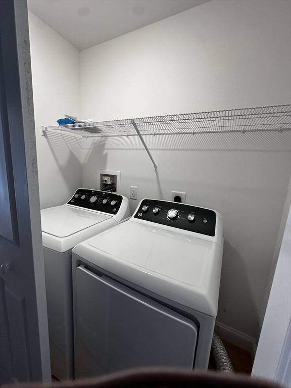56 Dudley Road Billerica, MA 01821 - Photo 16 of 29 a close up view of washer and dryer