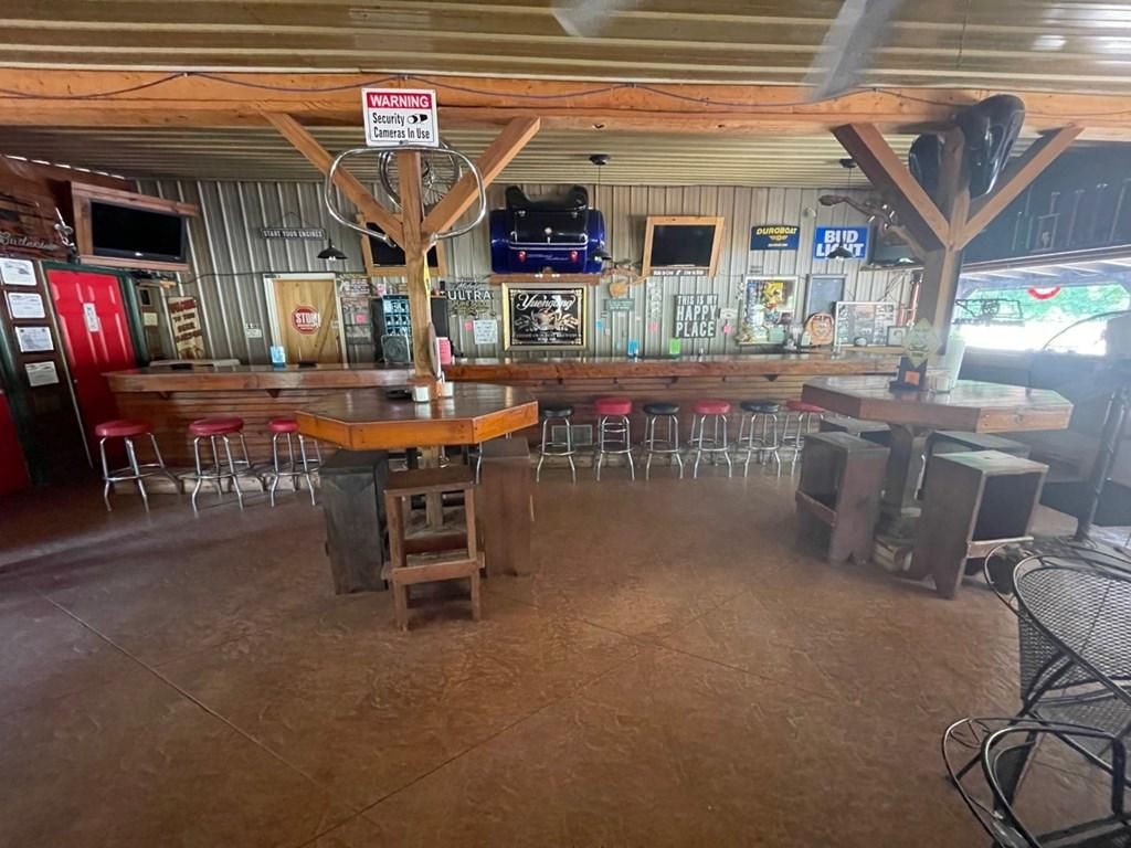 2576 West Antioch Road Springville, TN 38256 - Photo 6 of 9 a view of a chairs and table in a patio