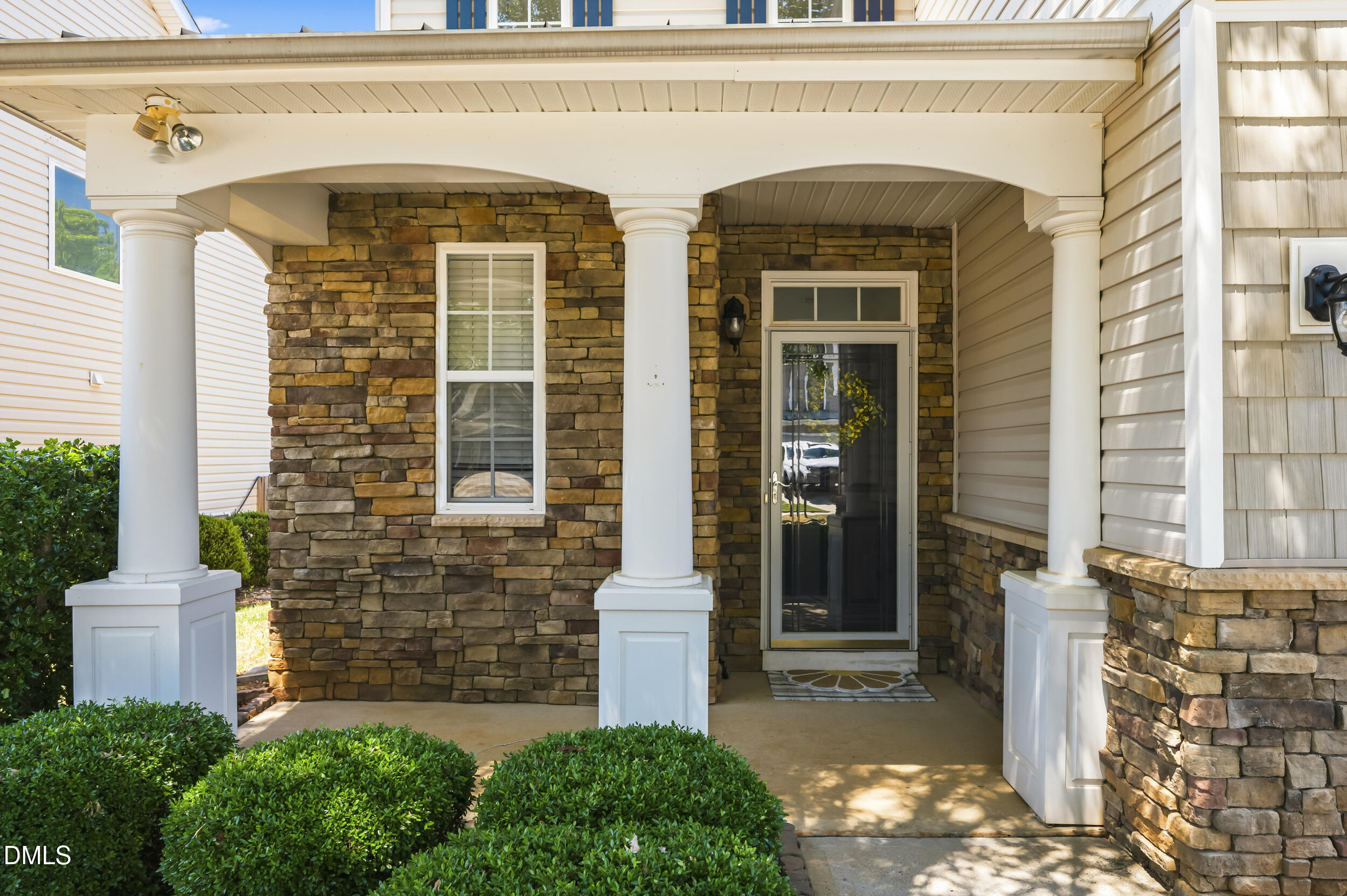 112 Ryder Cup Circle Raleigh, NC 27603 - Photo 3 of 45 a front view of a house with a porch