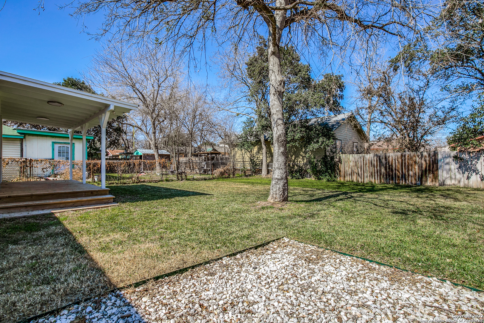 311 Clarence Street San Antonio, TX 78212 - Photo 18 of 23 a view of a backyard with large trees