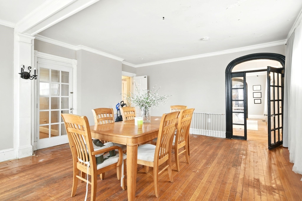 346 Maple Street Springfield, MA 01105 - Photo 11 of 36 a view of a dining room with furniture and wooden floor