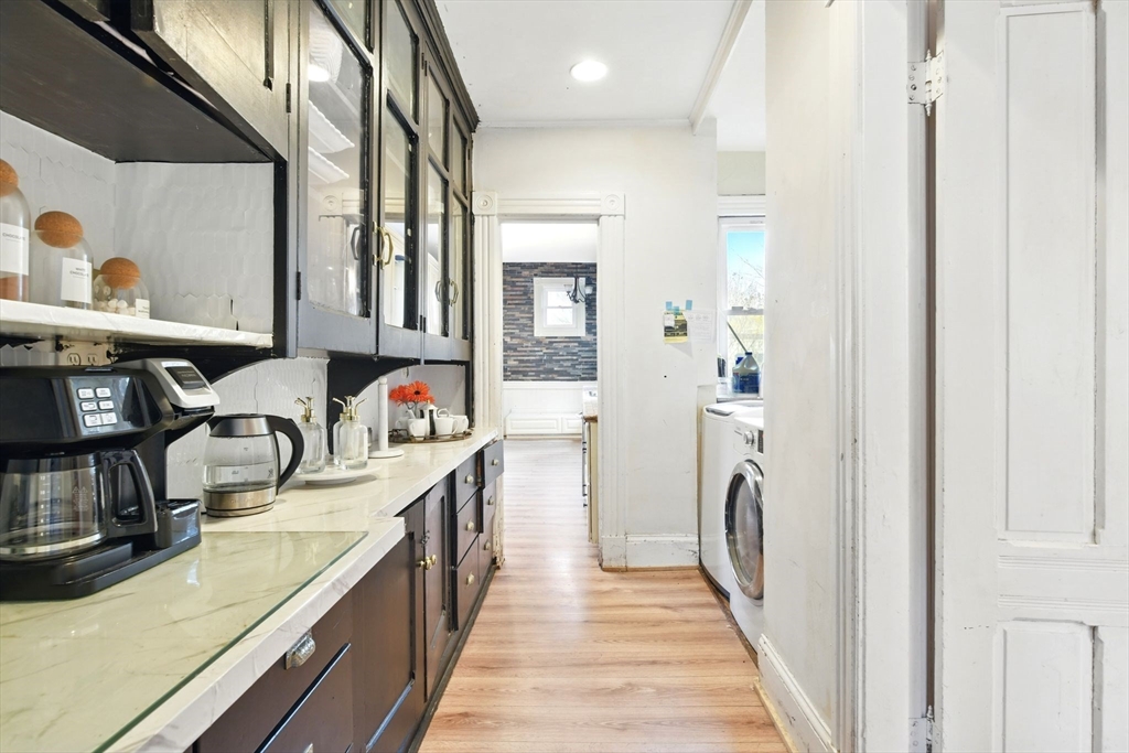 346 Maple Street Springfield, MA 01105 - Photo 12 of 36 a hallway with a view of living room