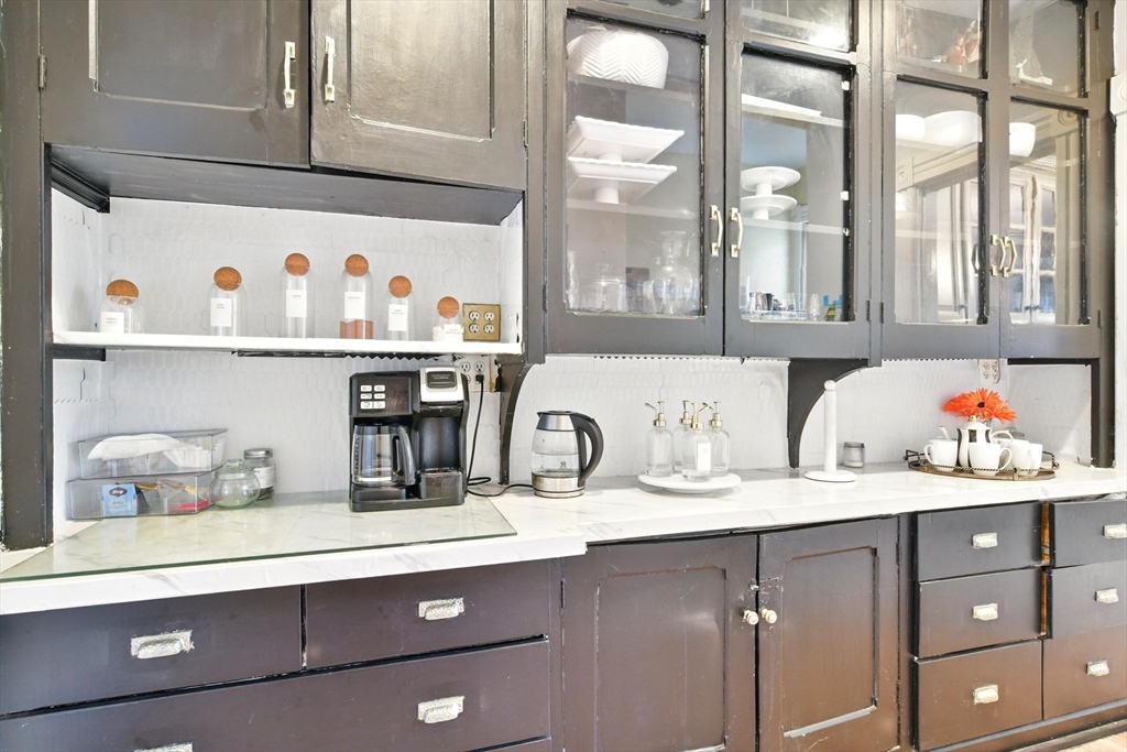 346 Maple Street Springfield, MA 01105 - Photo 13 of 36 a kitchen with cabinets and window