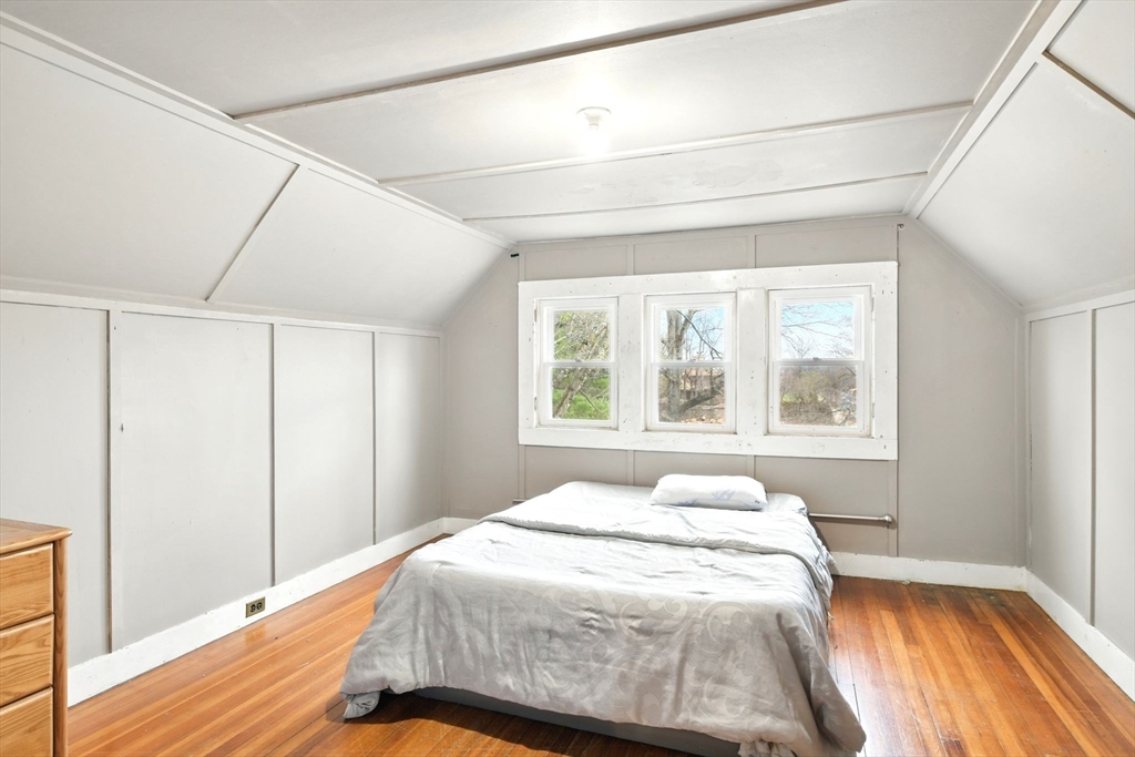 346 Maple Street Springfield, MA 01105 - Photo 16 of 36 a bedroom with a bed and a window