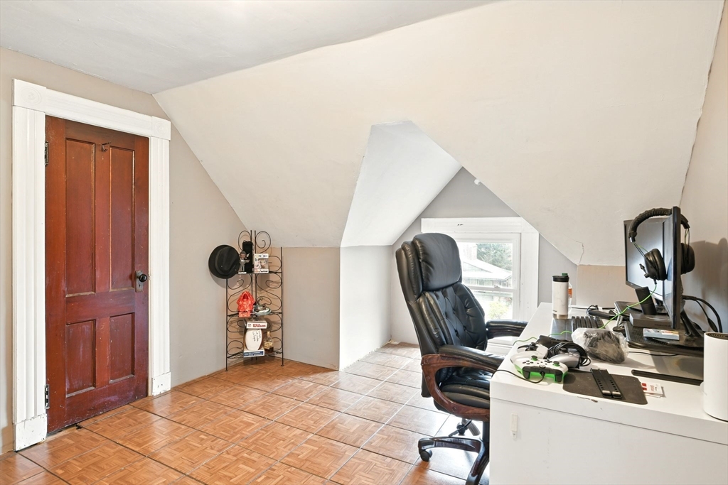 346 Maple Street Springfield, MA 01105 - Photo 18 of 36 a view of a workspace with furniture and a window