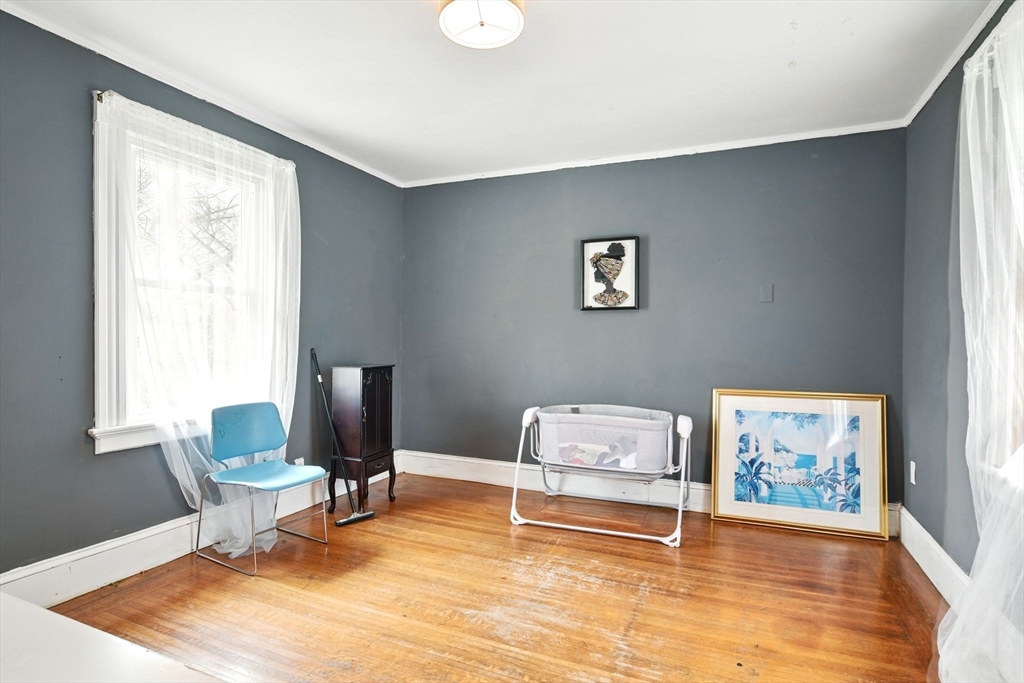 346 Maple Street Springfield, MA 01105 - Photo 20 of 36 a living room with furniture and a window
