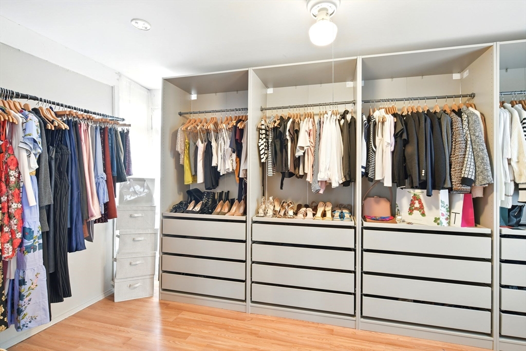 346 Maple Street Springfield, MA 01105 - Photo 30 of 36 a view of walk in closet with clothes and shoes