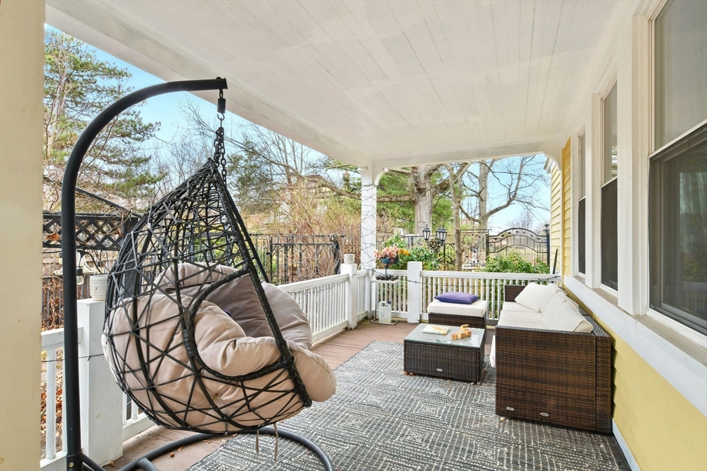 346 Maple Street Springfield, MA 01105 - Photo 32 of 36 a living room with furniture and a floor to ceiling window