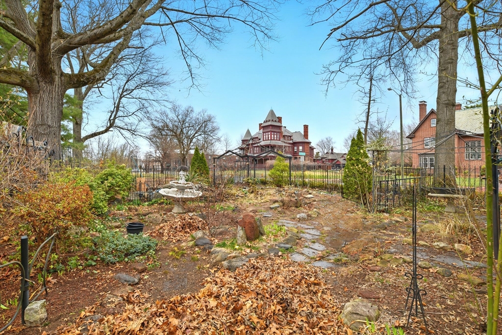 346 Maple Street Springfield, MA 01105 - Photo 33 of 36 a view of a yard with plants and trees