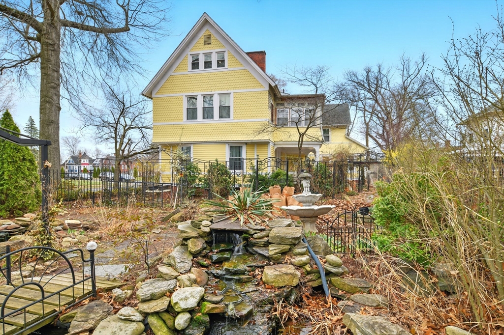 346 Maple Street Springfield, MA 01105 - Photo 34 of 36 a view of a house with a yard