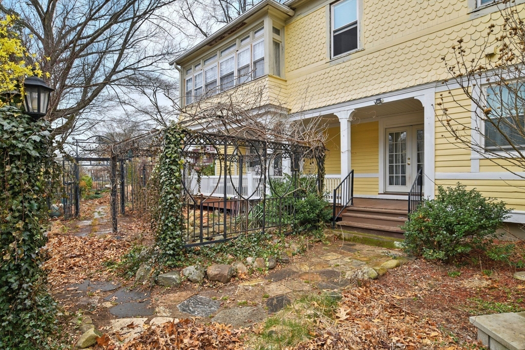 346 Maple Street Springfield, MA 01105 - Photo 4 of 36 a front view of a house with garden