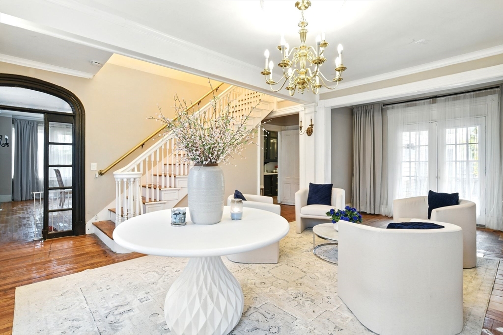 346 Maple Street Springfield, MA 01105 - Photo 5 of 36 a living room with dining table and a large window