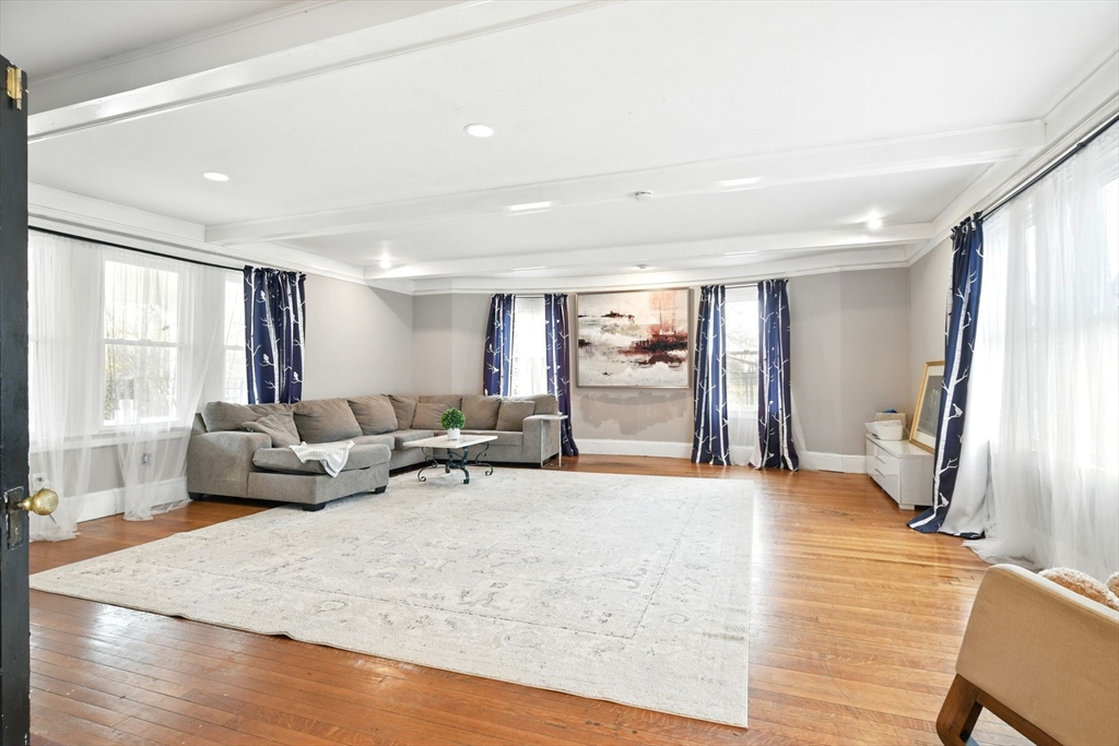 346 Maple Street Springfield, MA 01105 - Photo 8 of 36 a living room with furniture window and wooden floor