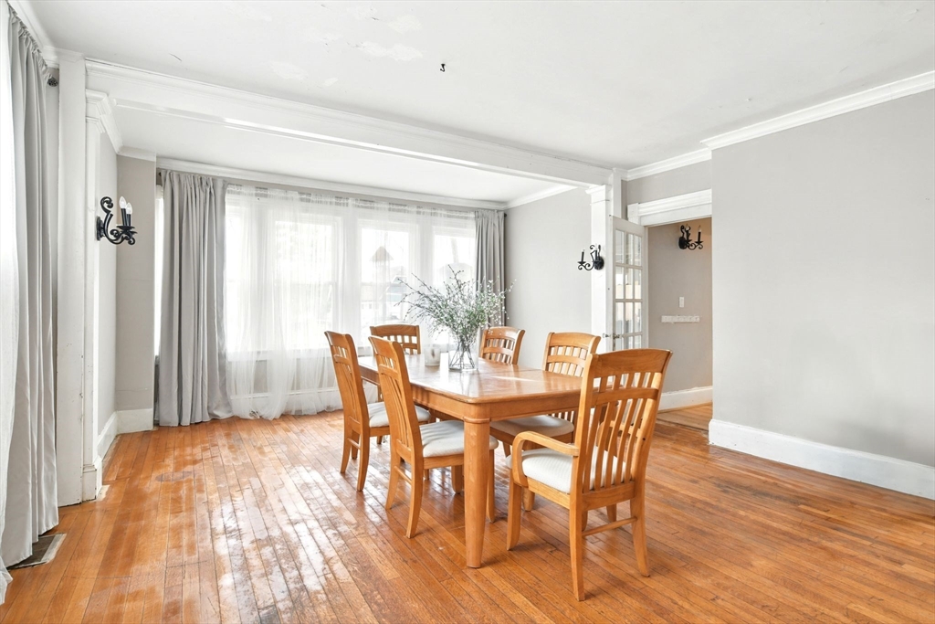 346 Maple Street Springfield, MA 01105 - Photo 10 of 36 a view of a dining room with furniture and wooden floor