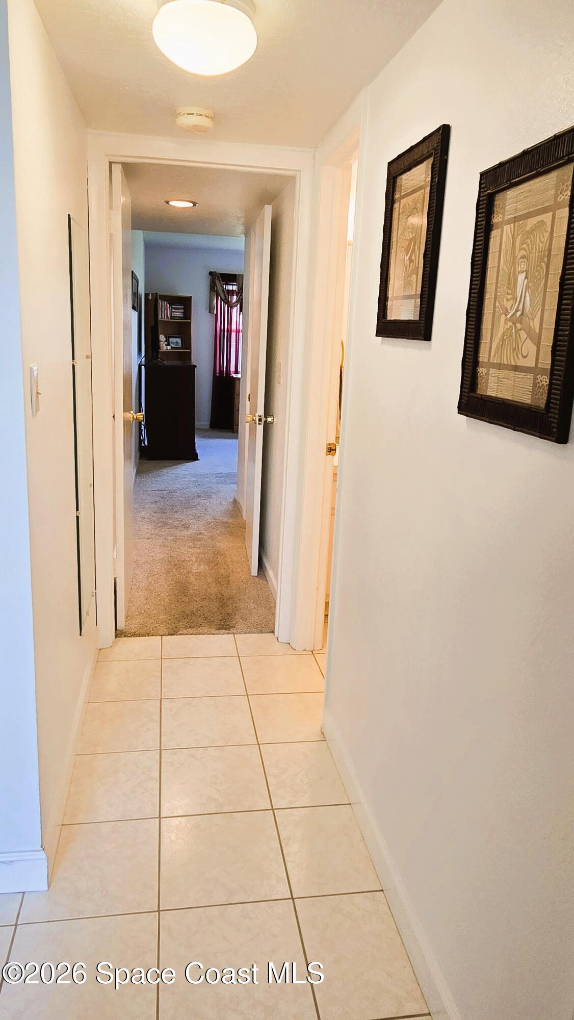 412 School Road, Unit 88 Indian Harbour Beach, FL 32937 - Photo 22 of 50 Hallway to the main bath