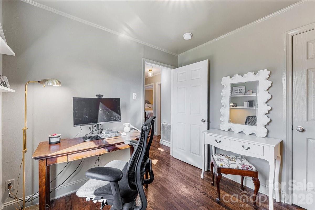 4922 Valley Stream Road Charlotte, NC 28209 - Photo 27 of 33 a view of a workspace with furniture