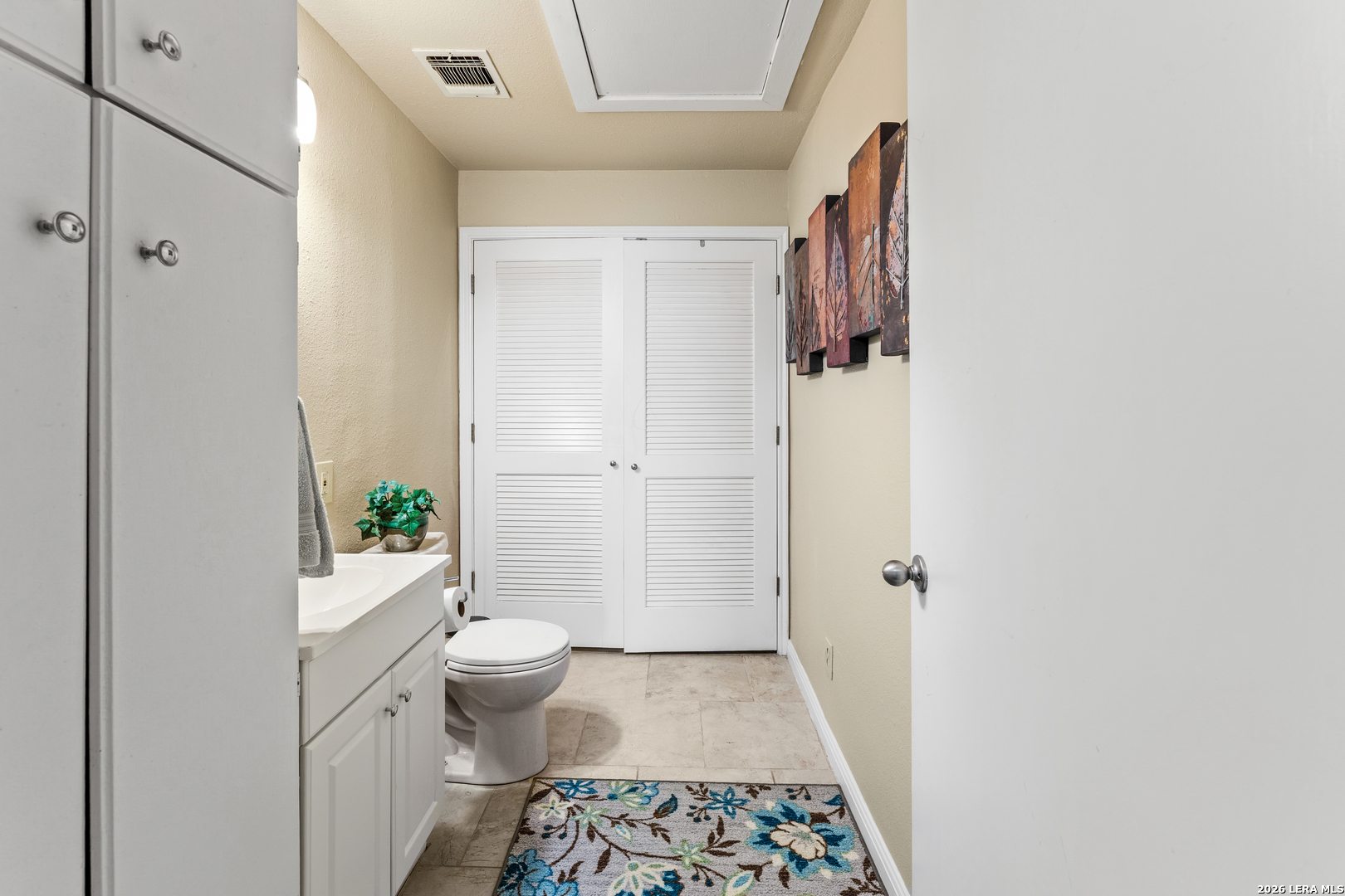 4515 Stapper Road St. Hedwig, TX 78152 - Photo 30 of 64 a bathroom with a sink and toilet