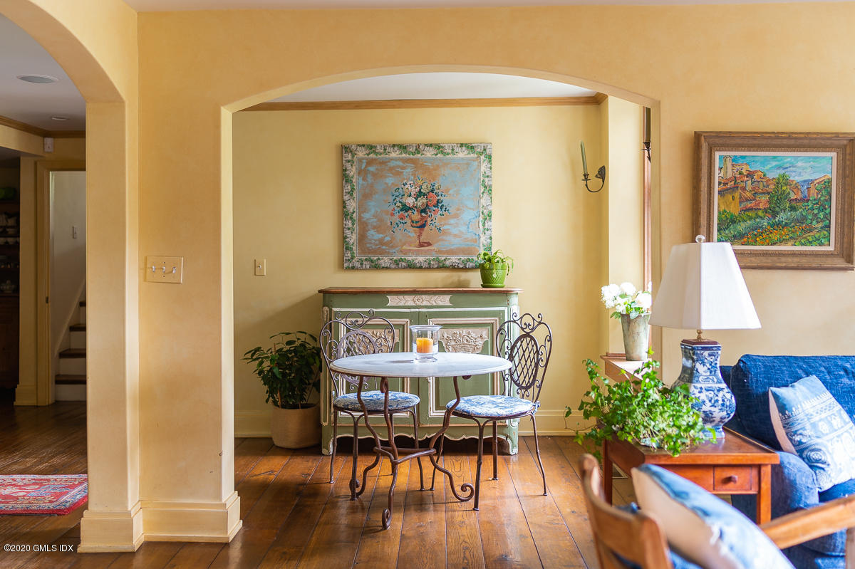 10 Frost Road Greenwich, CT 06830 - Photo 11 of 24 a view of a dining room with furniture window and wooden floor