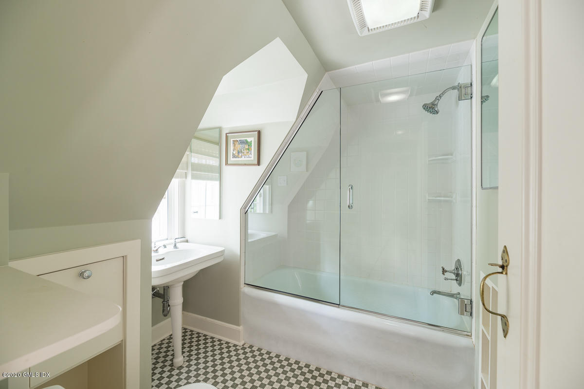 10 Frost Road Greenwich, CT 06830 - Photo 20 of 24 a view of a hallway with wooden floor and entryway