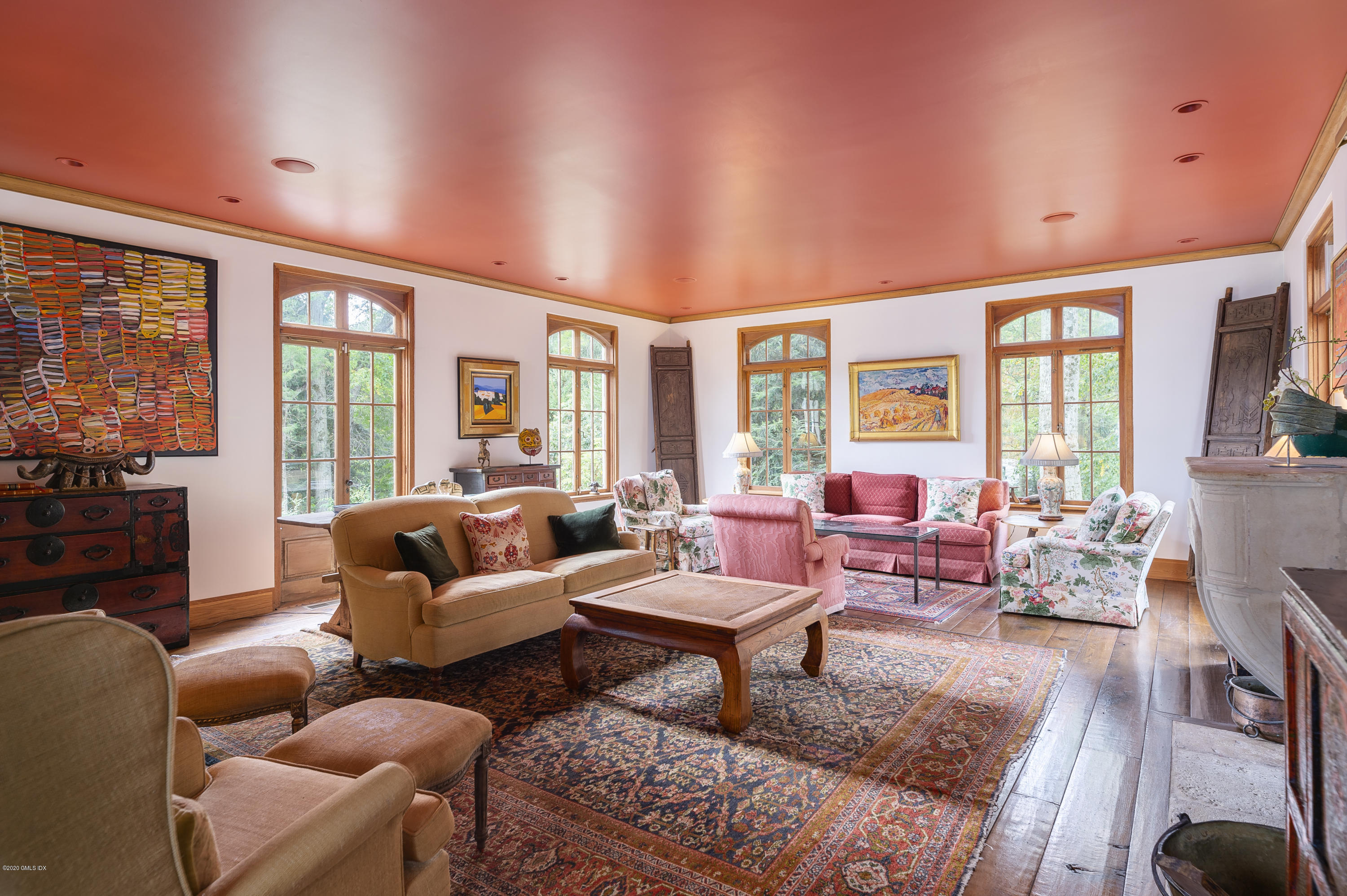 10 Frost Road Greenwich, CT 06830 - Photo 6 of 24 a living room with furniture and large windows
