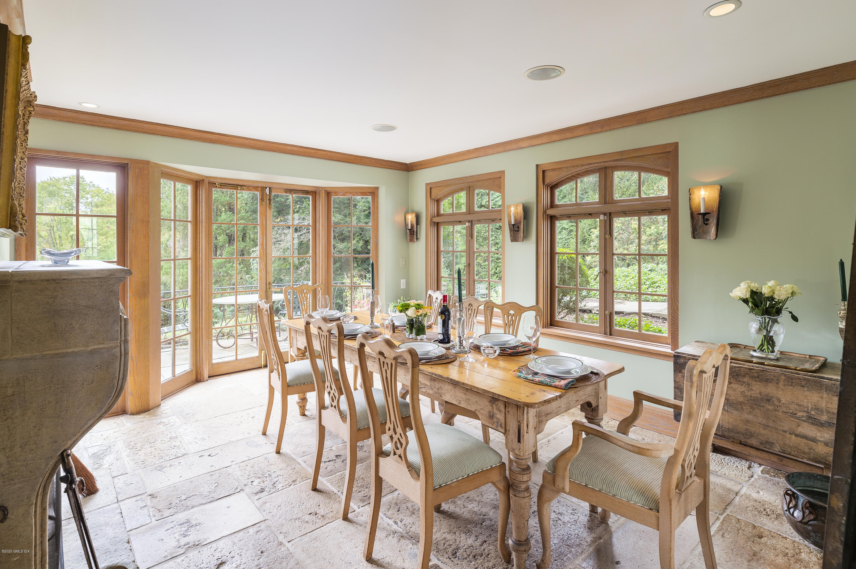 10 Frost Road Greenwich, CT 06830 - Photo 7 of 24 a dining room with furniture and large windows