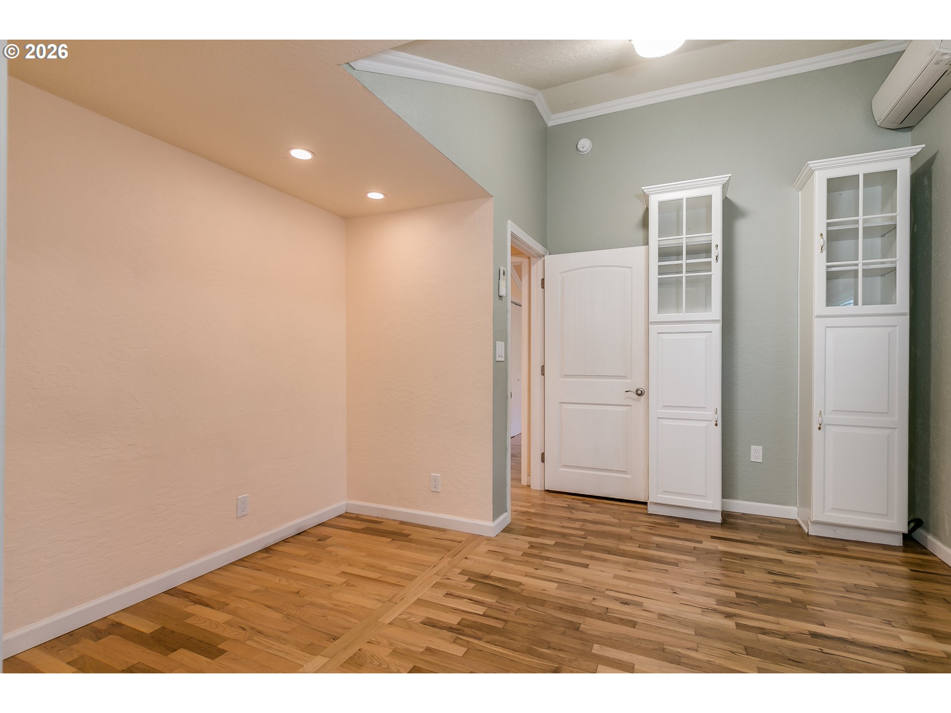 715 Ellsworth Street Eugene, OR 97402 - Photo 14 of 26 a view of an empty room with wooden floor and closet