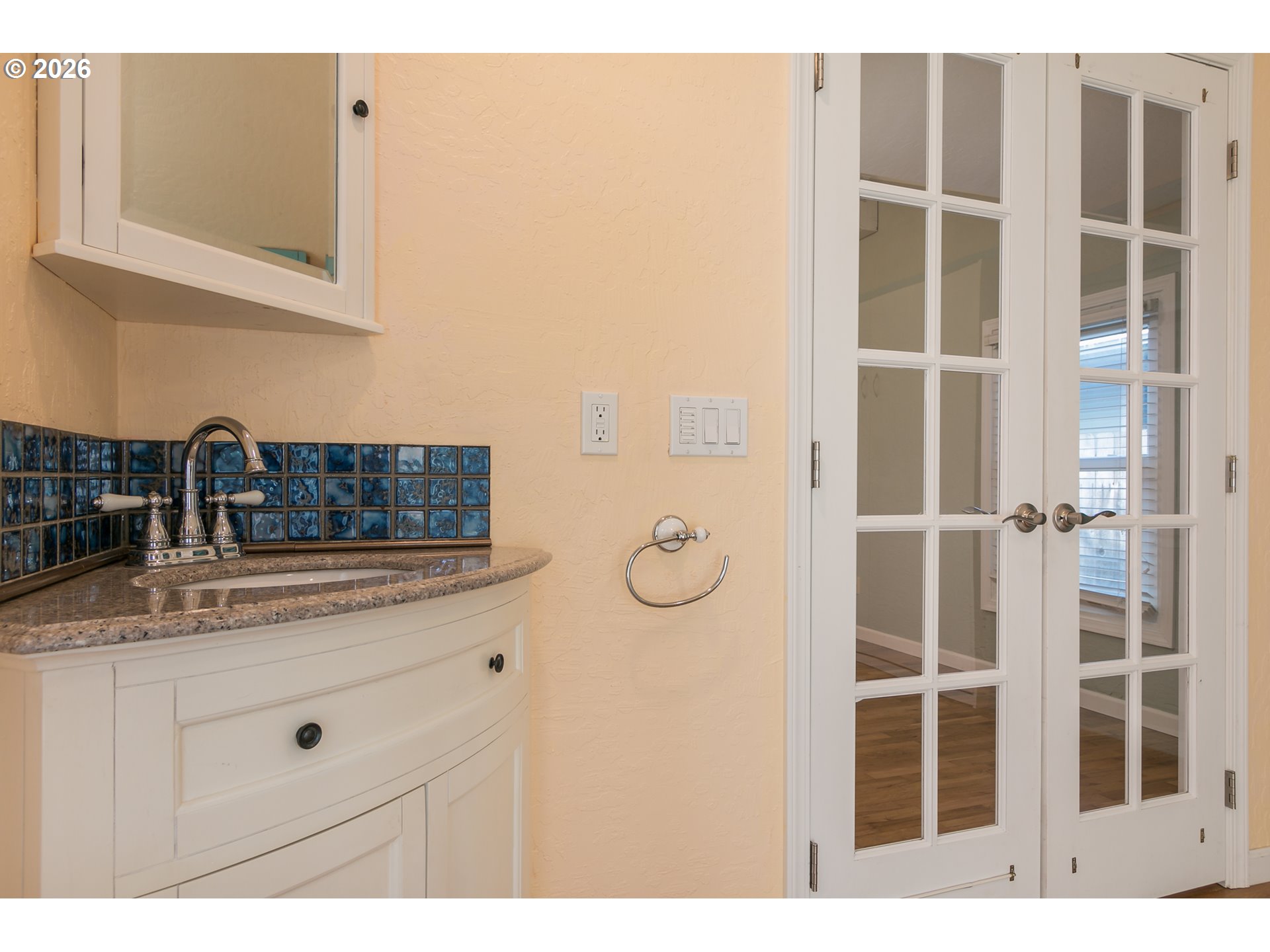 715 Ellsworth Street Eugene, OR 97402 - Photo 16 of 26 a kitchen with a sink and cabinets
