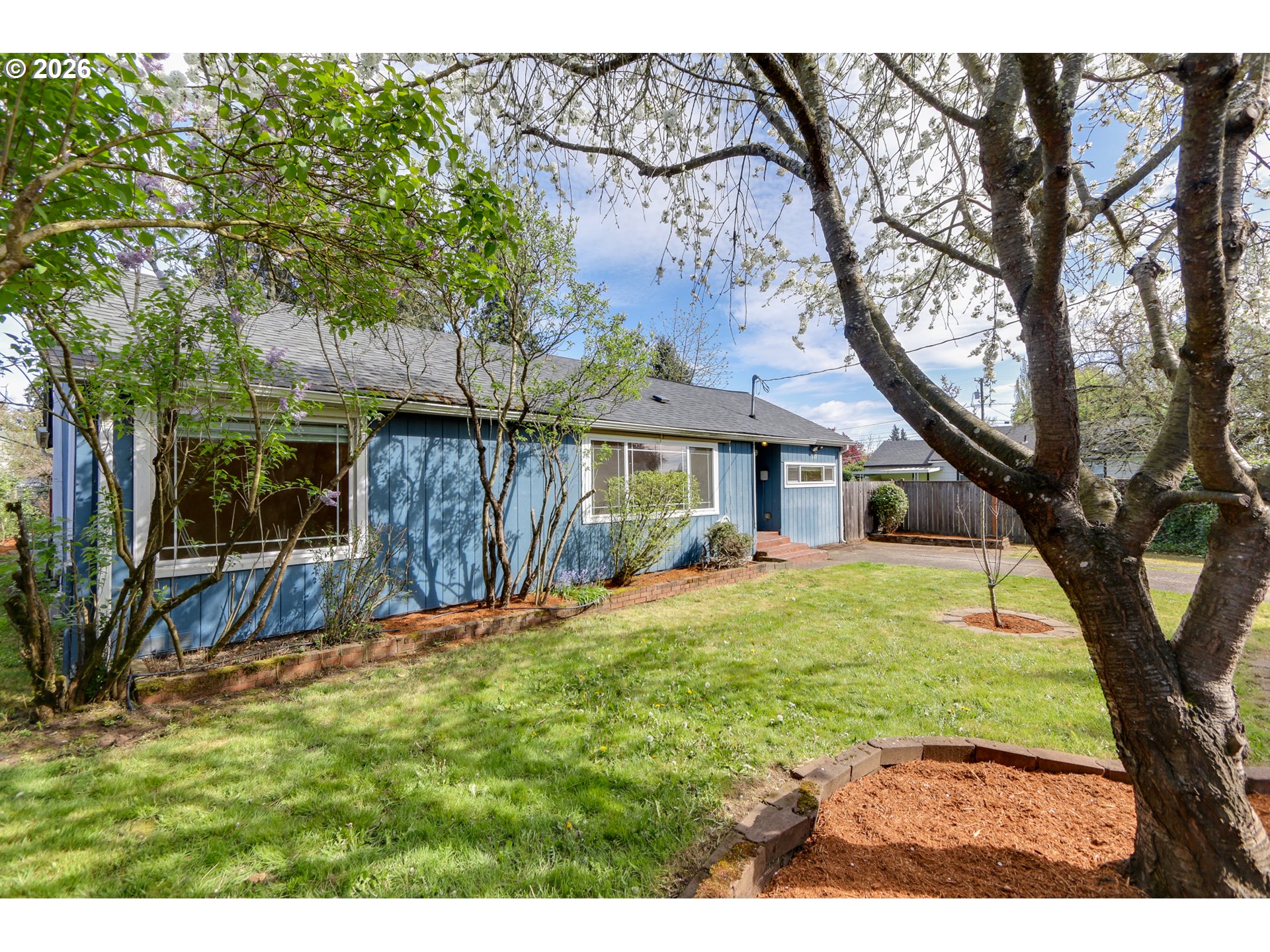 715 Ellsworth Street Eugene, OR 97402 - Photo 18 of 26 a view of a house with a yard