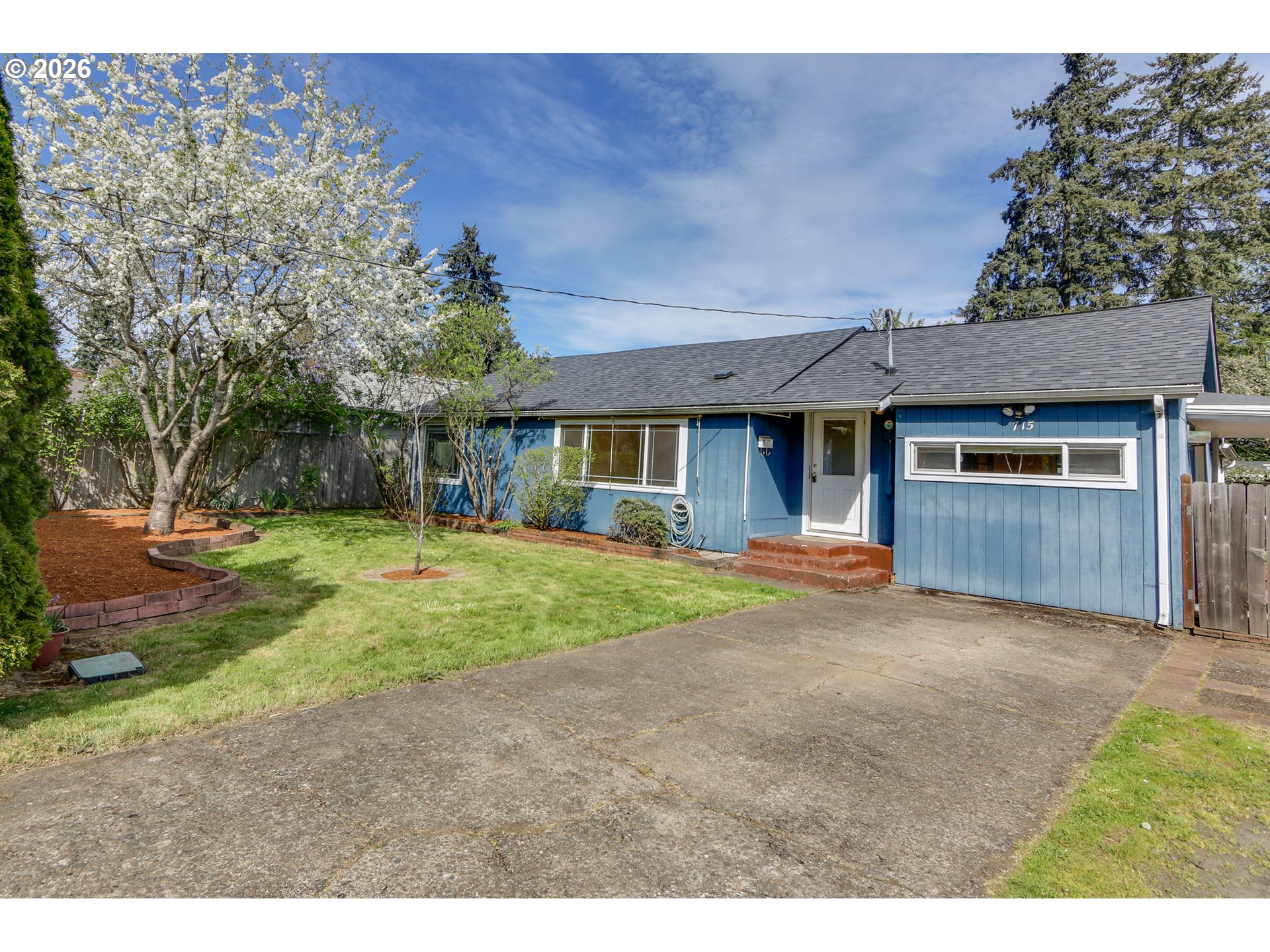 715 Ellsworth Street Eugene, OR 97402 - Photo 2 of 26 a view of a house with backyard and trees
