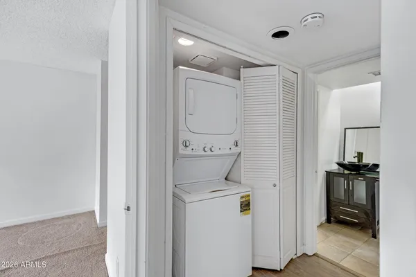 a view of a house with pool and a yard