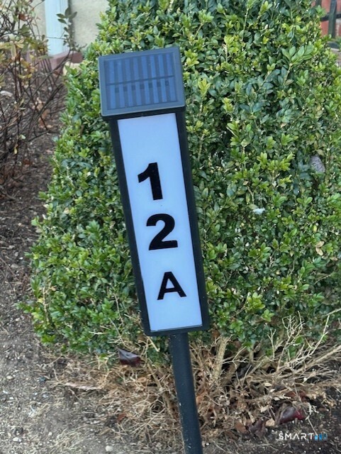 236 Glenbrook Road, Unit 12A Stamford, CT 06906 - Photo 3 of 18 a view of outdoor space with front of a house