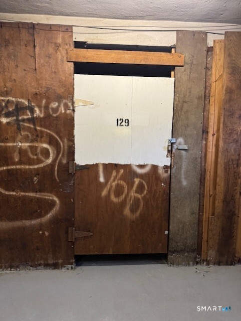 236 Glenbrook Road, Unit 12A Stamford, CT 06906 - Photo 9 of 18 a bathroom with a bathtub and shower