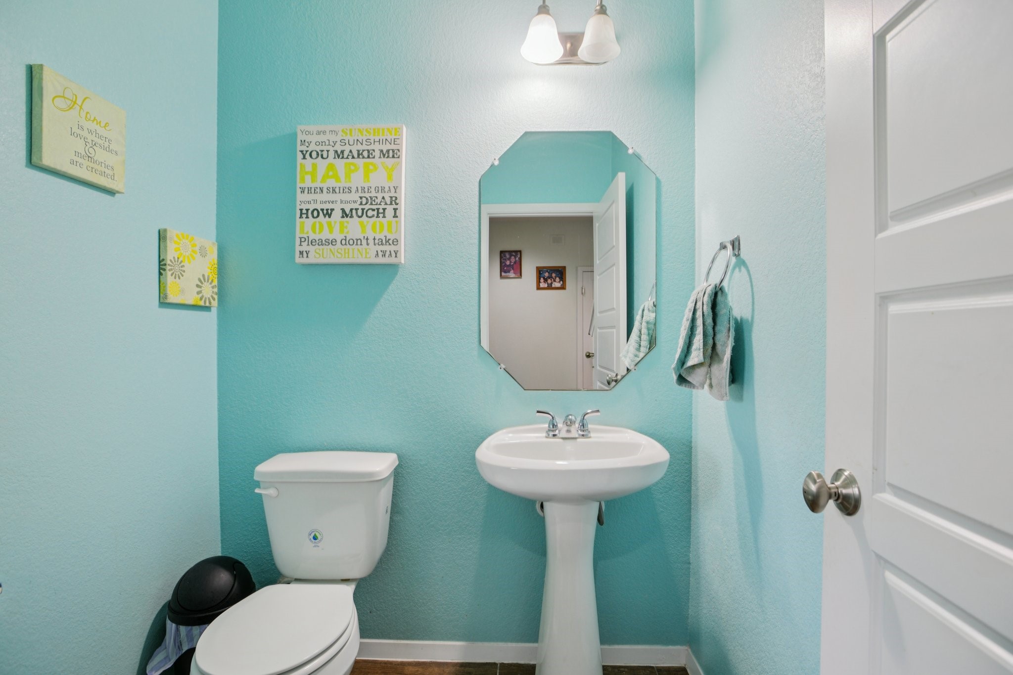 119 Saranac Drive Elgin, TX 78621 - Photo 15 of 41 a bathroom with a toilet sink and mirror