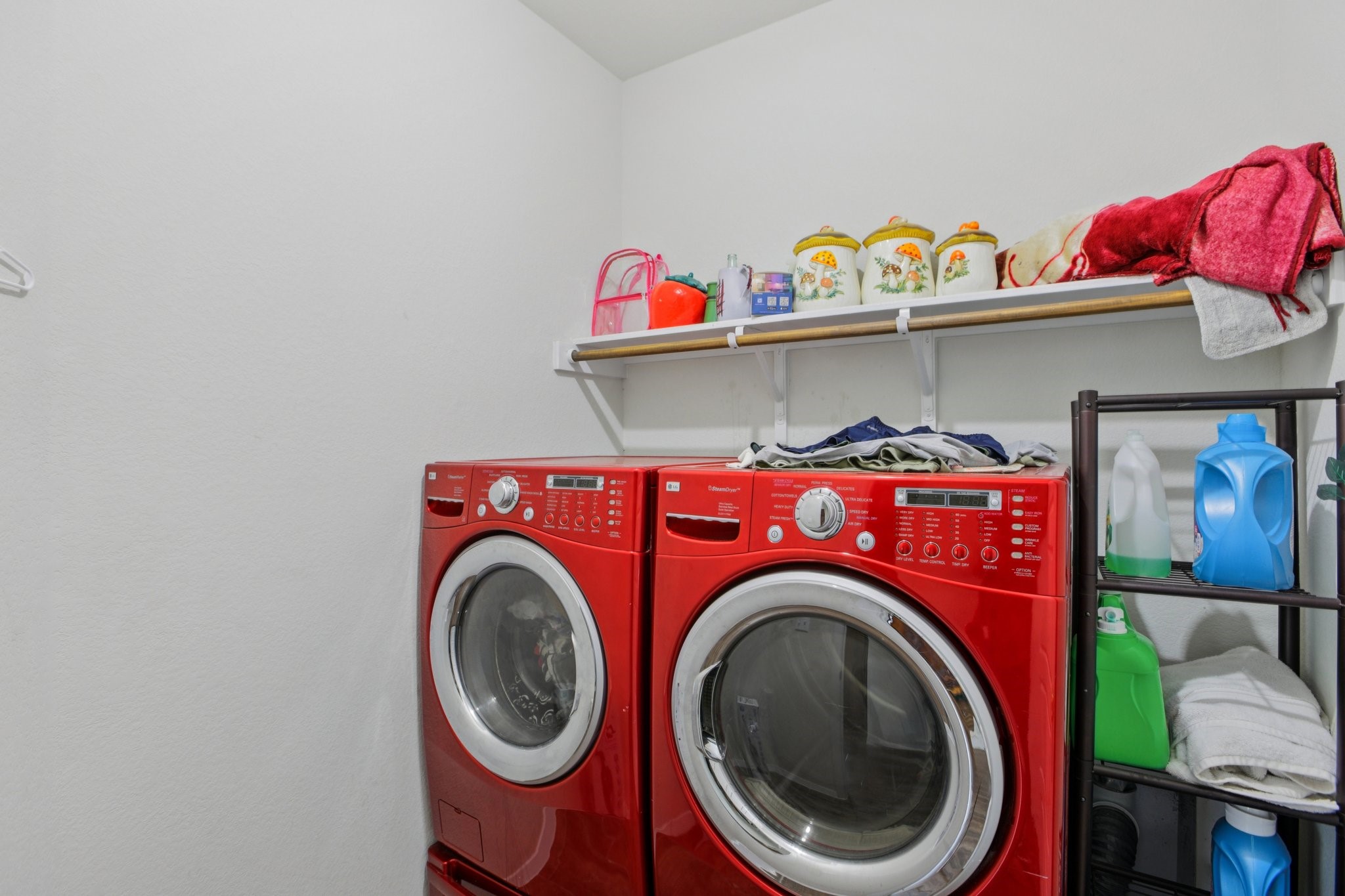 119 Saranac Drive Elgin, TX 78621 - Photo 16 of 41 a utility room with dryer and washer