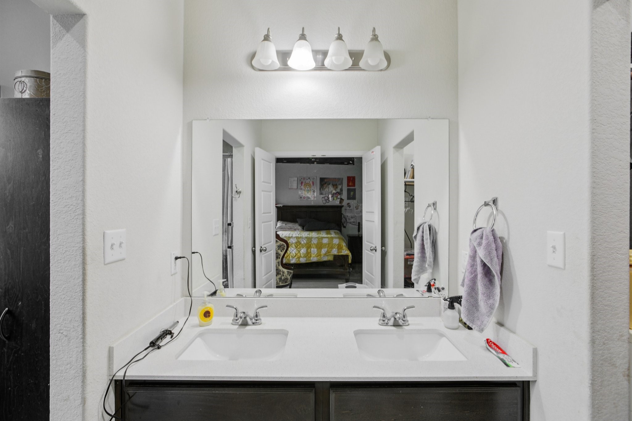 119 Saranac Drive Elgin, TX 78621 - Photo 17 of 41 a bathroom with a sink and a mirror