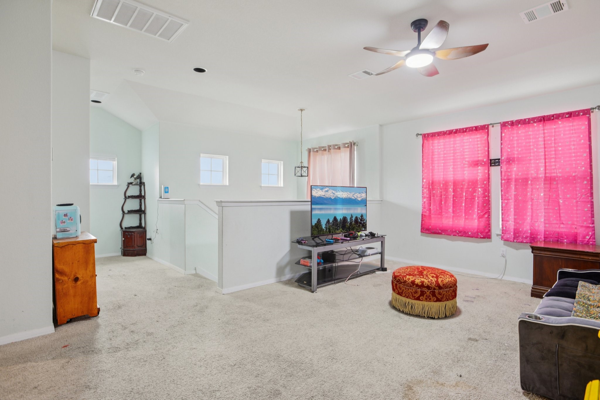 119 Saranac Drive Elgin, TX 78621 - Photo 23 of 41 a kitchen with stainless steel appliances kitchen island granite countertop a refrigerator and a stove top oven