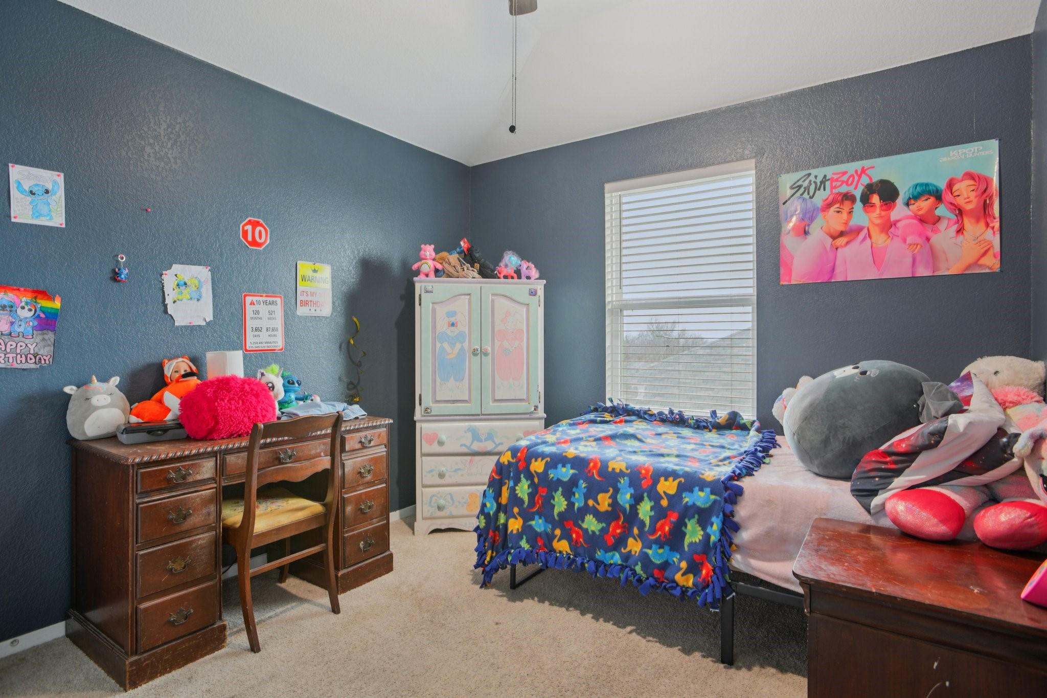 119 Saranac Drive Elgin, TX 78621 - Photo 26 of 41 a bedroom with a bed a couch and dresser