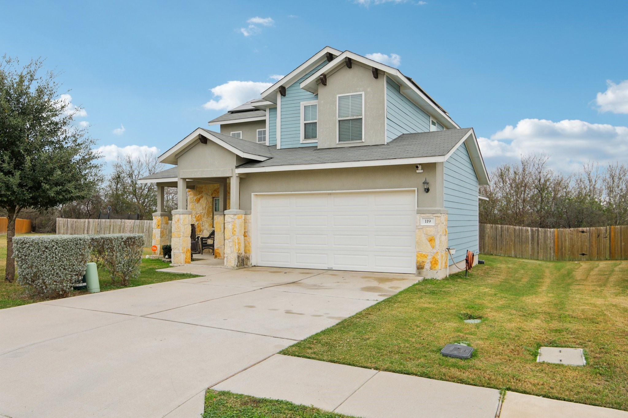 119 Saranac Drive Elgin, TX 78621 - Photo 3 of 41 a front view of a house with yard