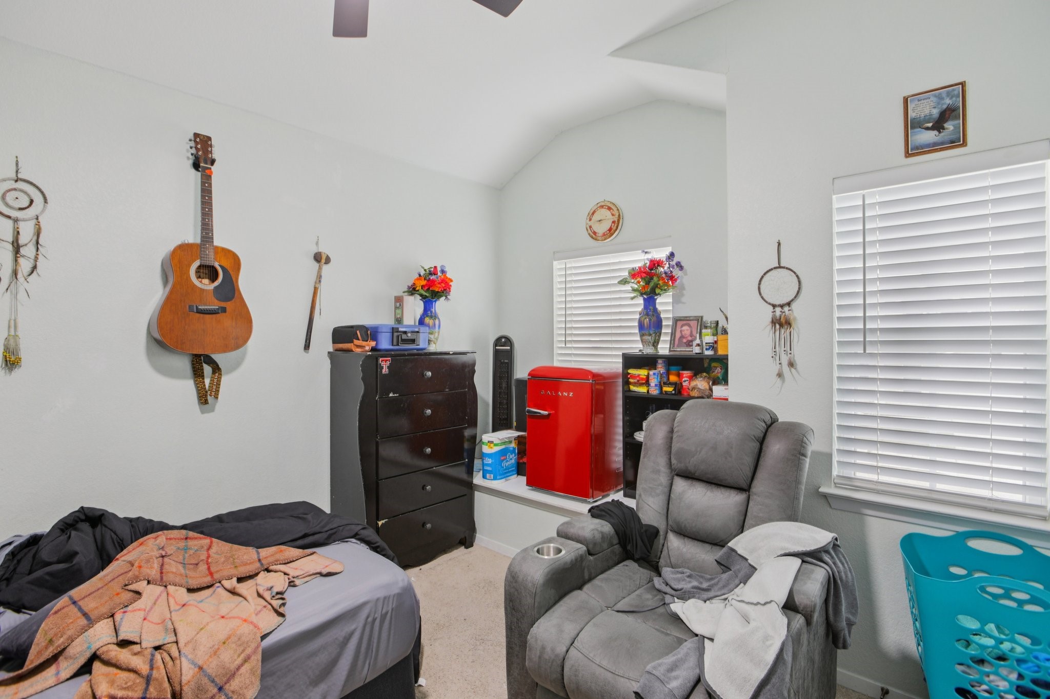 119 Saranac Drive Elgin, TX 78621 - Photo 34 of 41 a bedroom with a bed and cabinets