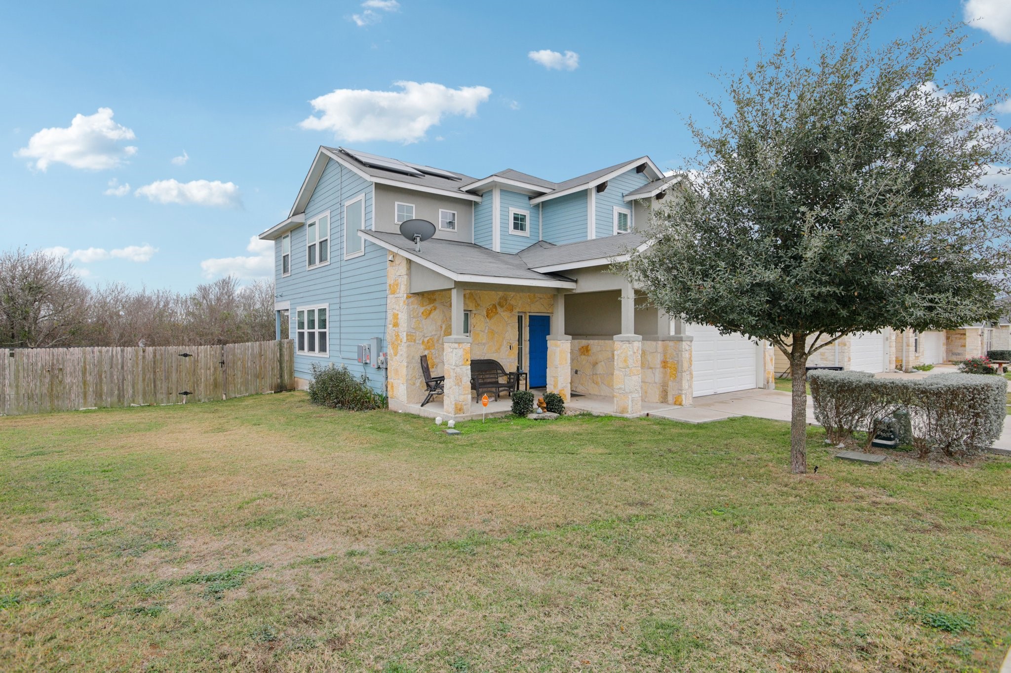 119 Saranac Drive Elgin, TX 78621 - Photo 5 of 41 a front view of a house with garden