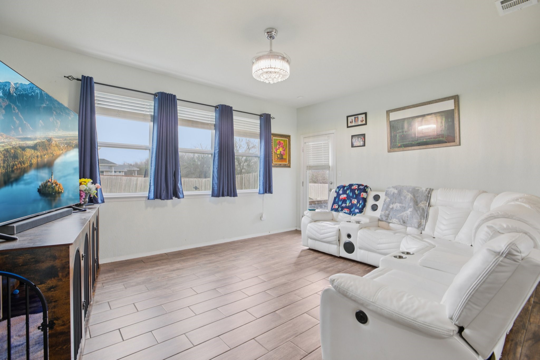 119 Saranac Drive Elgin, TX 78621 - Photo 7 of 41 a living room with furniture and a flat screen tv