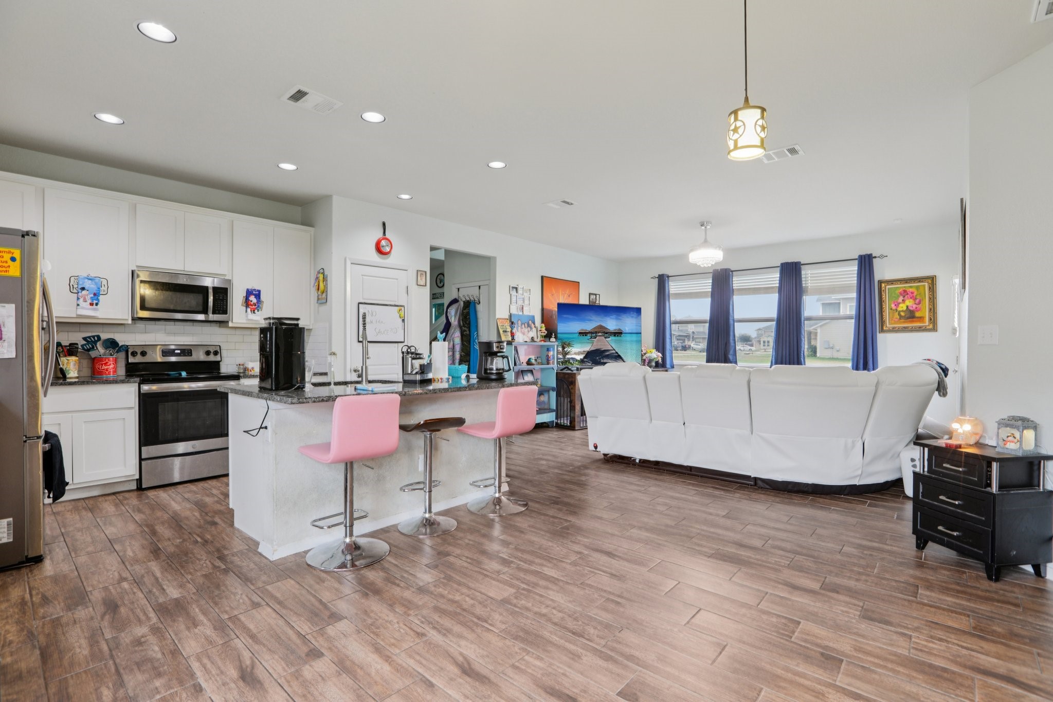 119 Saranac Drive Elgin, TX 78621 - Photo 10 of 41 a living room with furniture and kitchen view