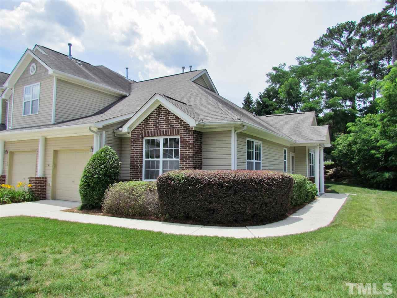 2700 Andover Glen Road Raleigh, NC 27604 - Photo 1 of 25 a front view of a house with a yard