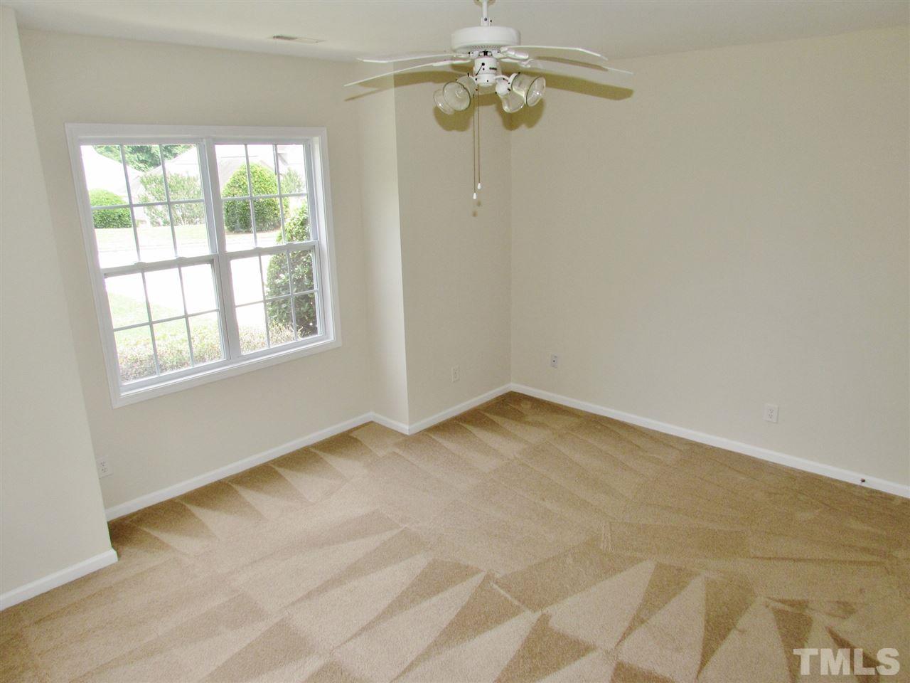 2700 Andover Glen Road Raleigh, NC 27604 - Photo 11 of 25 an empty room with a window