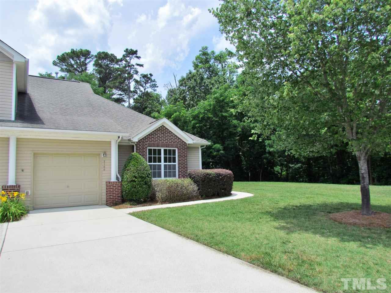 2700 Andover Glen Road Raleigh, NC 27604 - Photo 3 of 25 a view of a house with a yard and potted plants