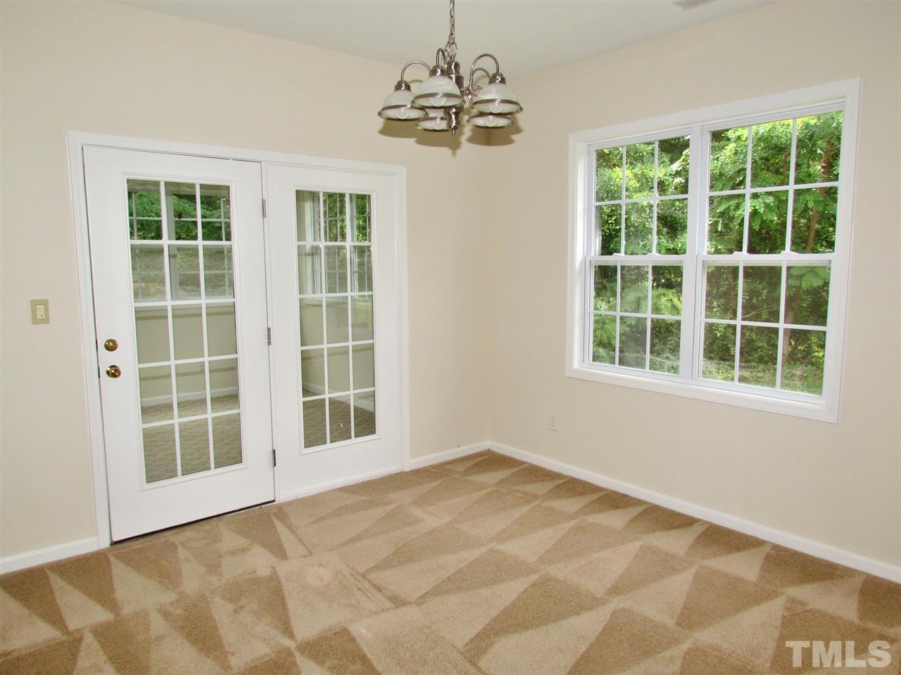 2700 Andover Glen Road Raleigh, NC 27604 - Photo 6 of 25 a view of an empty room with a window